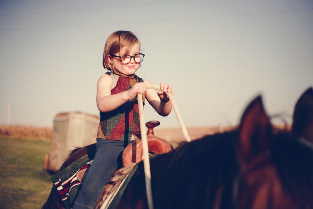 Young girl riding